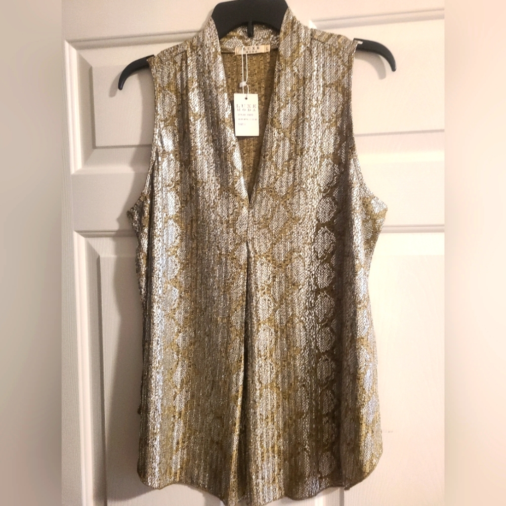 Festive sleeveless blouse